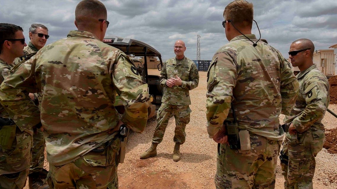 U.S. Army Brig. Gen. Damian T. Donahoe talks with service members during a battlefield circulation in Somalia. (AP)