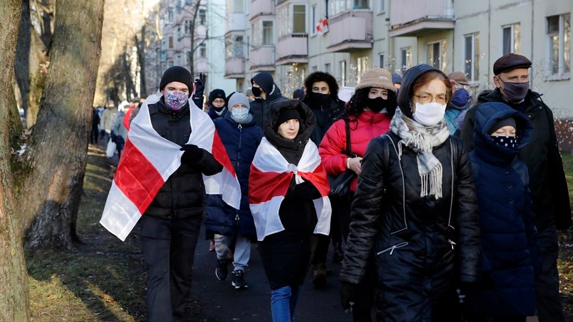 Demonstrators, most of them wearing face masks to help curb the spread of the coronavirus, attend an opposition rally in Minsk, Belarus, Dec. 6, 2020. (AP)