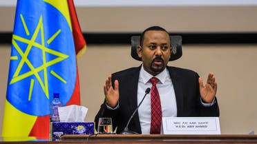 Ethiopian Prime Minister Abiy Ahmed gestures at the House of Peoples Representatives in Addis Ababa, Ethiopia, on November 30, 2020 to respond to the Parliament on the current conflict between Ethiopian National Defence Forces and the leaders of the Tigray People’s Liberation Front (TPLF). Ethiopian Prime Minister Abiy Ahmed said on November 30, 2020 Tigray region's dissident leaders had fled west of the regional capital after weeks of fighting, but said federal forces were monitoring them closely and would attack them soon.
