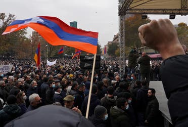 People attend an opposition rally to demand the resignation of Armenian Prime Minister Nikol Pashinyan following the signing of a deal to end a military conflict over Nagorno-Karabakh, in Yerevan, Armenia December 5, 2020. (File photo: Reuters)
