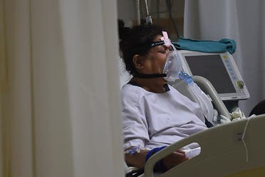 مريضة مصابة بكورونا في مستشفى بالهند (أرشيفية)
