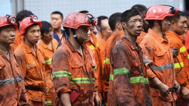 Rescuers wait outside the Songzao Coal Mine near Chongqing, in southwest China on September 27, 2020. (File photo, AFP)