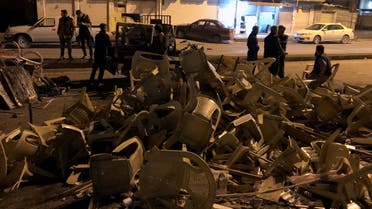 Damaged chairs from a building for the Kurdistan Islamic Group party are seen after it was attacked during anti-government protests on the outskirt of Sulaimaniyah, Iraq December 7, 2020. (Reuters/Ako Rasheed)