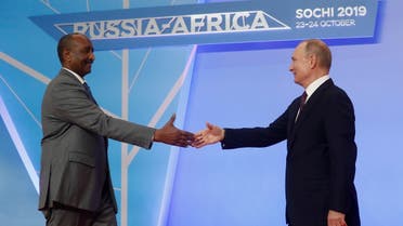 Russian President Vladimir Putin shakes hands with Chairman of the Sovereignty Council of Sudan Abdel Fattah al-Burhan. (File photo: Reuters)