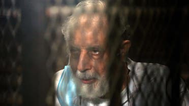 Mahmud Ezzat, the Muslim brotherhood group acting leader, during his first session in his trial . (AFP)