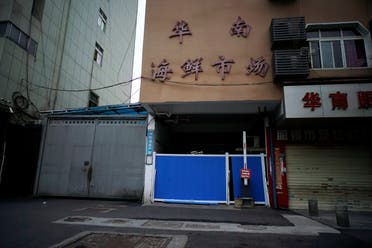  A blocked entrance to Huanan seafood market, where the coronavirus that can cause COVID-19 is believed to have first surfaced, is seen in Wuhan, Hubei province, China March 30, 2020. Picture taken March 30, 2020. (Reuters)