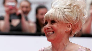 Fans photograph actress Barbara Windsor as she arrives for the British Academy Television Awards. (Reuters)