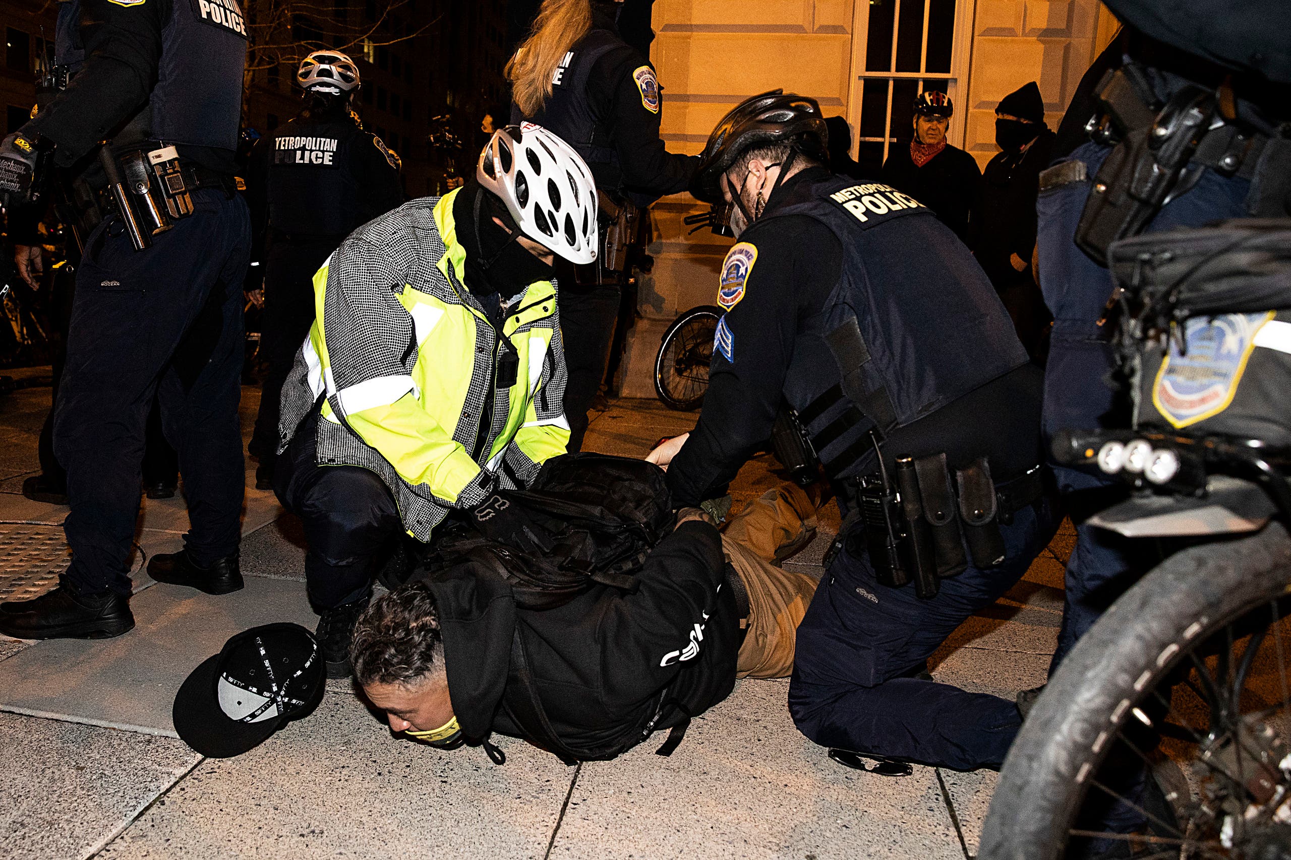 Washington DC Police arrest a member of the Proud Boys near Black Lives Matter Plaza on December 12, 2020 in Washington, DC. (AFP)