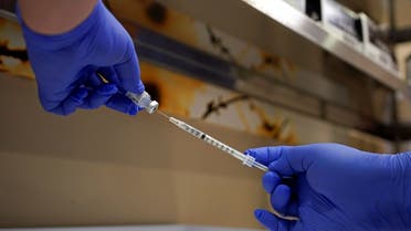 The Pfizer-BioNTech coronavirus disease (COVID-19) vaccines are administered to healthcare professionals, in Indianapolis. (Reuters)