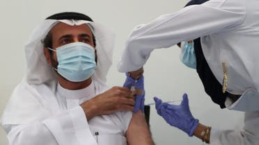Saudi Arabia’s Minister of Health, Dr. Tawfiq al-Rabiah, receives the coronavirus vaccine. (Via @SaudiMOH Twitter)