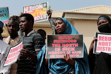 Demonstrators gather to urge authorities to rescue hundreds of abducted schoolboys, in northwestern state of Katsina, Nigeria, on December 17, 2020. (Reuters)
