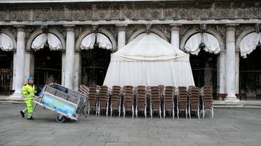 Chairs are seen outside the closed Caffe Florian after the Italian government imposed a virtual lockdown on the north of Italy including Venice to try to contain a coronavirus outbreak. (Reuters)