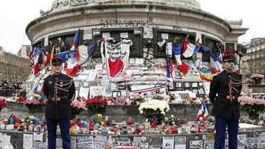 French Republican guards stand during a ceremony at Place de la Republique square to pay tribute to the victims of last year's shooting at the French satirical newspaper Charlie Hebdo, in Paris, France, January 10, 2016. (Reuters/Yohan Valat/Pool)