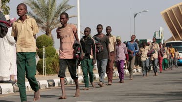 Freed Nigerian schoolboys walk after they were rescued by security forces in Katsina, Nigeria, December 18, 2020. REUTERS/Afolabi Sotunde