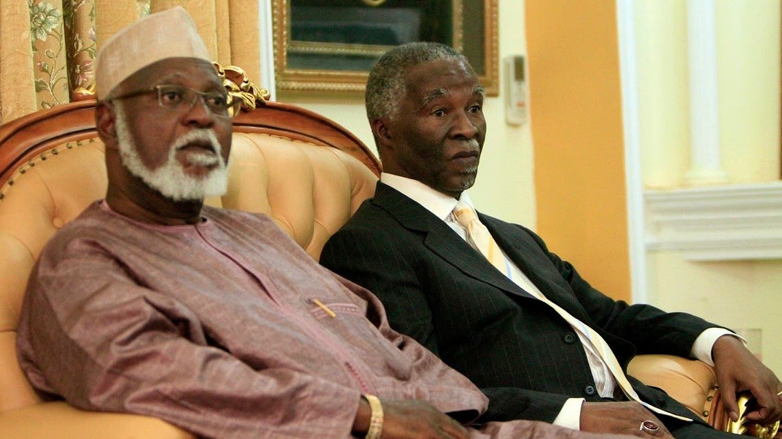 Former South African president Thabo Mbeki and former president of Burundi Pierre Buyoya sit together during a meeting in Khartoum. (File photo: Reuters)