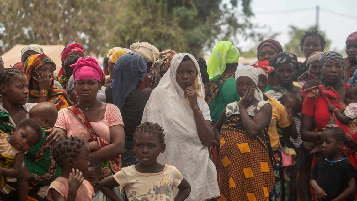 Displaced women attend a meeting on December 11, 2020 at the Centro Agr‡rio de Napala in Mozambique. (Alfredo Zuniga/AFP)