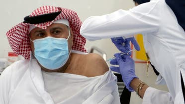 A Saudi man gets a dose of a coronavirus disease (COVID-19) vaccine, in Riyadh, Saudi Arabia December 17, 2020. (Reuters)