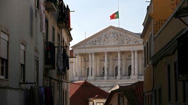 The national flag atop of the Portuguese parliament building in Lisbon (AFP)