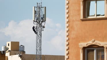 2020-11-10T12An Egyptian technician fixes a mobile communication antenna at the top of a Vodafone tower in the Cairo suburb of Maadi, Egypt, on November 10, 2020. (Reuters)5959Z_603551263_RC2C0K9NIBBR_RTRMADP_3_EGYPT-VODAFONE