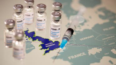 Vials labelled "COVID-19 Coronavirus-Vaccine" and a medical syringe are seen placed on the European Union map in this picture illustration taken December 2, 2020. (Reuters)