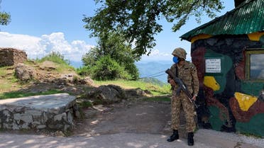 Pakistan Army soldier stands guard at a hilltop post during a trip organised by the army, near the Line of Control (LoC), in Charikot Sector, Kashmir. (File photo: Reuters)