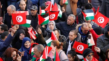 Protesters holding Palestinian and Tunisian flags shout slogans during a protest against U.S. President Donald Trump's Middle East peace plan, in the down town of Tunis, Tunisia February 5, 2020. (Reuters)