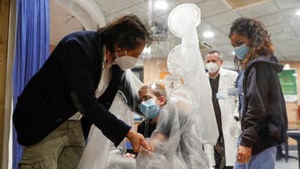 Coronavirus: Children’s hospital patients feel warmth of a hug through plastic tent 