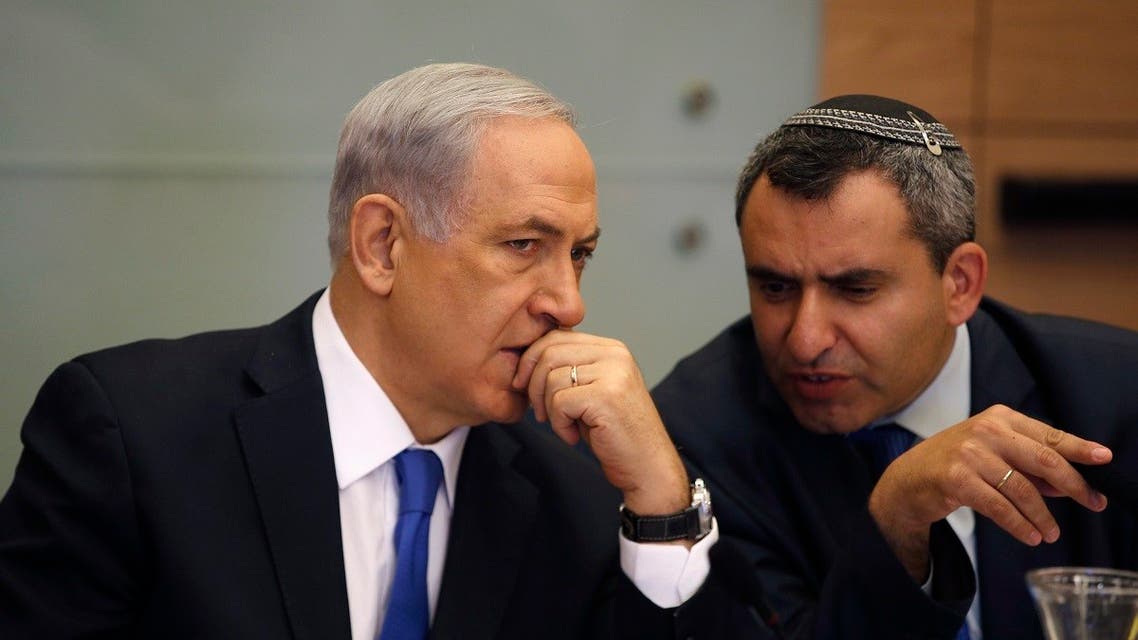 A file photo shows Israeli PM Benjamin Netanyahu speaks with member of the Knesset for Likud Zeev Elkin. (Reuters)