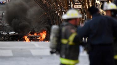 A vehicle burns near the site of an explosion in the area of Second and Commerce in Nashville. (Reuters)