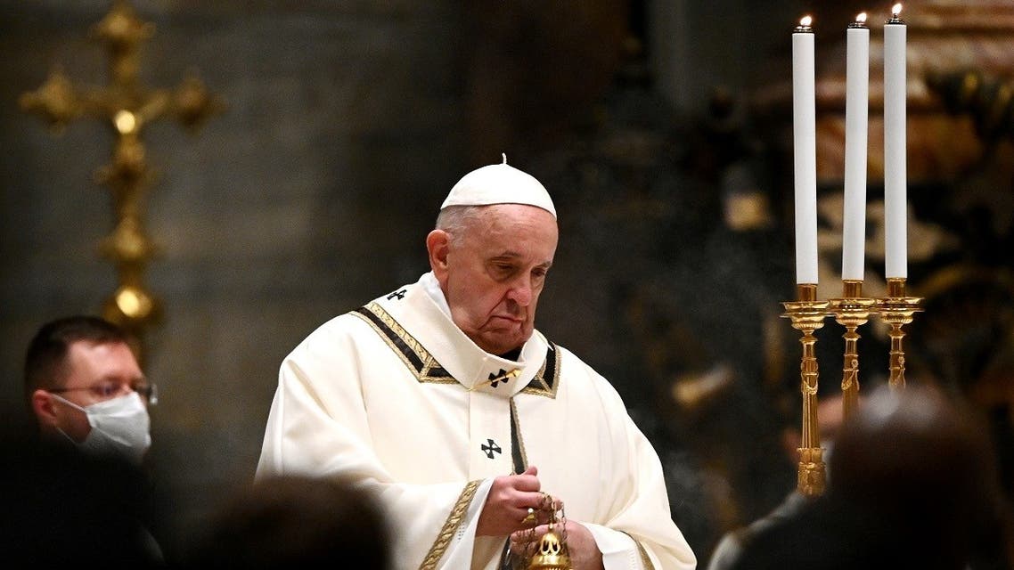 Pope Francis leads the Mass on Christmas Eve in St. Peter's Basilica amid the coronavirus pandemic at the Vatican, on December 24, 2020. (Reuters)