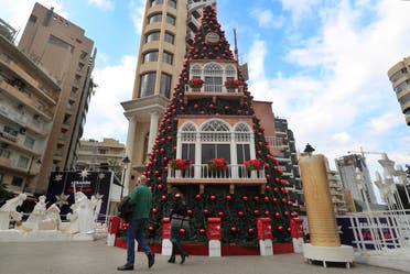 A Christmas tree is decorated to look like Beirut's ancient houses that were damaged in the Aug. 4 seaport explosion. (The Associated Press)