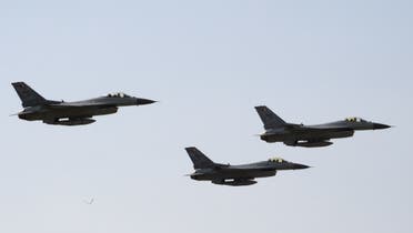 Royal Bahraini Air Force F-16s perform air maneuvers during the 2018 Bahrain International Airshow (BIAS) at the Sakhir Airbase, south of the Bahraini capital Manama on November 14 2018. (AFP)