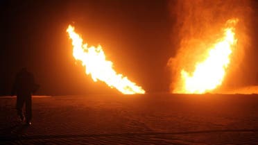 Flames raise from a pipeline that delivers gas to Israel and Jordan after it was hit by an explosion in the Al-Massaeed area, close to the town of Al-Arish in north Sinai, on MArch 5, 2012. (File photo: AFP)