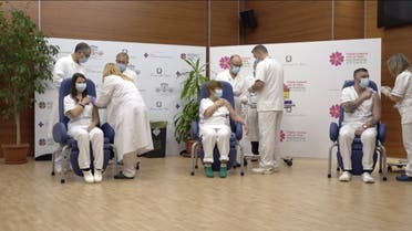 Claudia Alivernini, Maria Rosaria Capobianchi and Omar Altobelli, the first three recipients of Pfizer/BioNTech COVID-19 vaccine in Italy, receives their vaccination at the Spallanzani hospital in this screengrab taken from a video, in Rome, Italy on December 27, 2020. (Reuters)