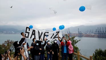 Relatives and supporters of the 12 Hong Kong people detained in mainland China release balloons from a peak overlooking Yantian district in the neighboring Chinese mainland city of Shenzhen, at a protest in Hong Kong, China. (File photo: Reuters)