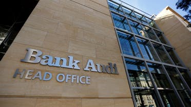 The logo of Bank Audi is seen at the main entrance of the Bank's head office in Beirut, Lebanon January 24, 2017. (Reuters)