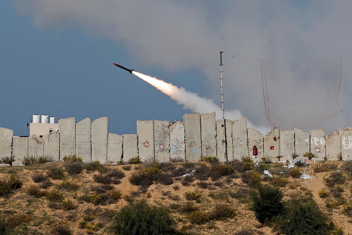 A rocket is launched by Palestinian militant groups into the Mediterranean Sea off the Gaza Strip at the start of their first-ever joint exercise, in Gaza City December 29, 2020. (Reuters)