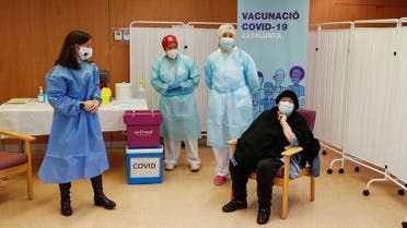 Balafia nursing home residents receive an injection with a dose of the Pfizer-BioNTech COVID-19 vaccine, in Lleida. (Reuters)