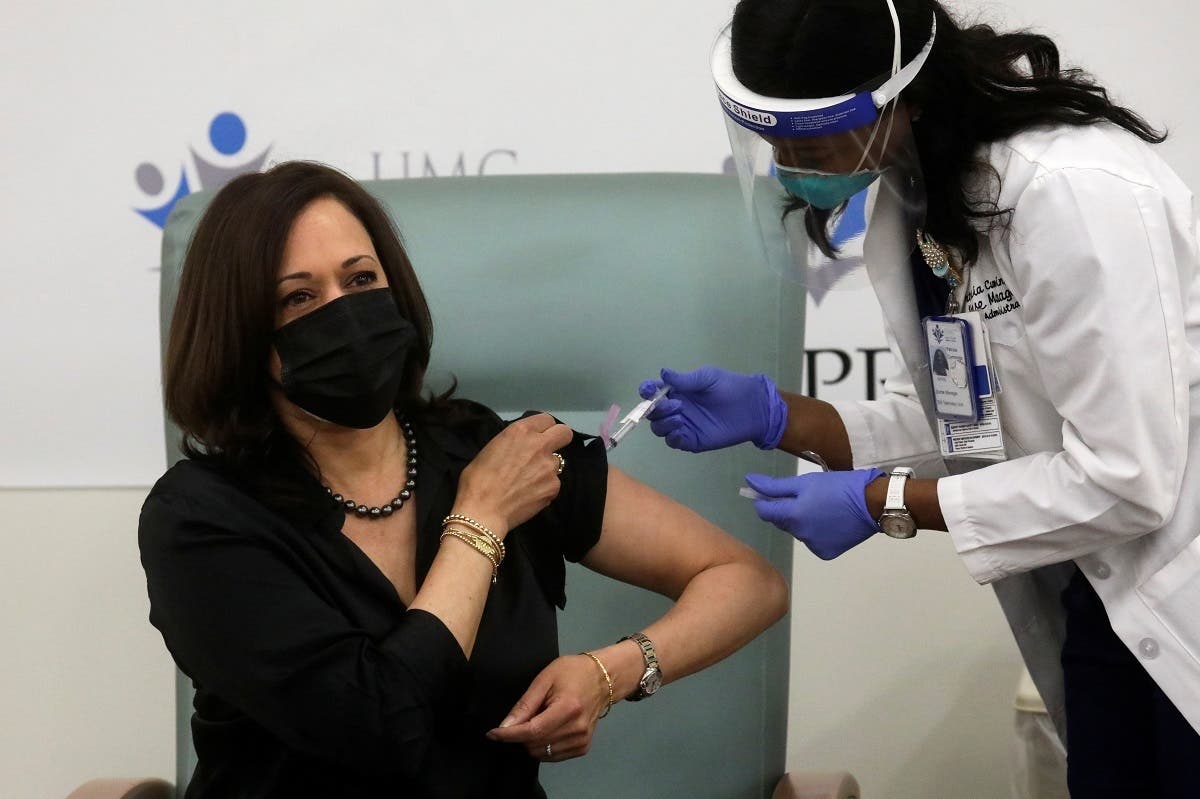 Registered Nurse Patricia Cummings gives US Vice President-elect Kamala Harris a dose of the Moderna COVID-19 vaccine at United Medical Center in Washington, US, December 29, 2020. (Reuters)