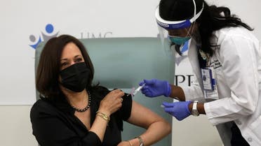 Registered Nurse Patricia Cummings gives US Vice President-elect Kamala Harris a dose of the Moderna COVID-19 vaccine at United Medical Center in Washington, US, December 29, 2020. (Reuters/Leah Millis)