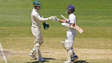 Tim Paine of Australia congratulates India’s Ajinkya Rahane after India won the match during day four of the second test match between Australia and India at The MCG, Melbourne, Australia, on December 29, 2020. (Reuters)