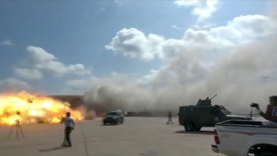 A video grab shows the moment an ordnance hit the airport in the southern Yemeni port city of Aden on December 30, 2020. (AFP)