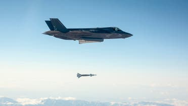 A U.S. Marine Corps F-35B short take-off and vertical landing (STOVL) fighter jet drops a laser-guided bomb during its first guided weapons release test at Edwards Air Force Base, California October 29, 2013. (Reuters)