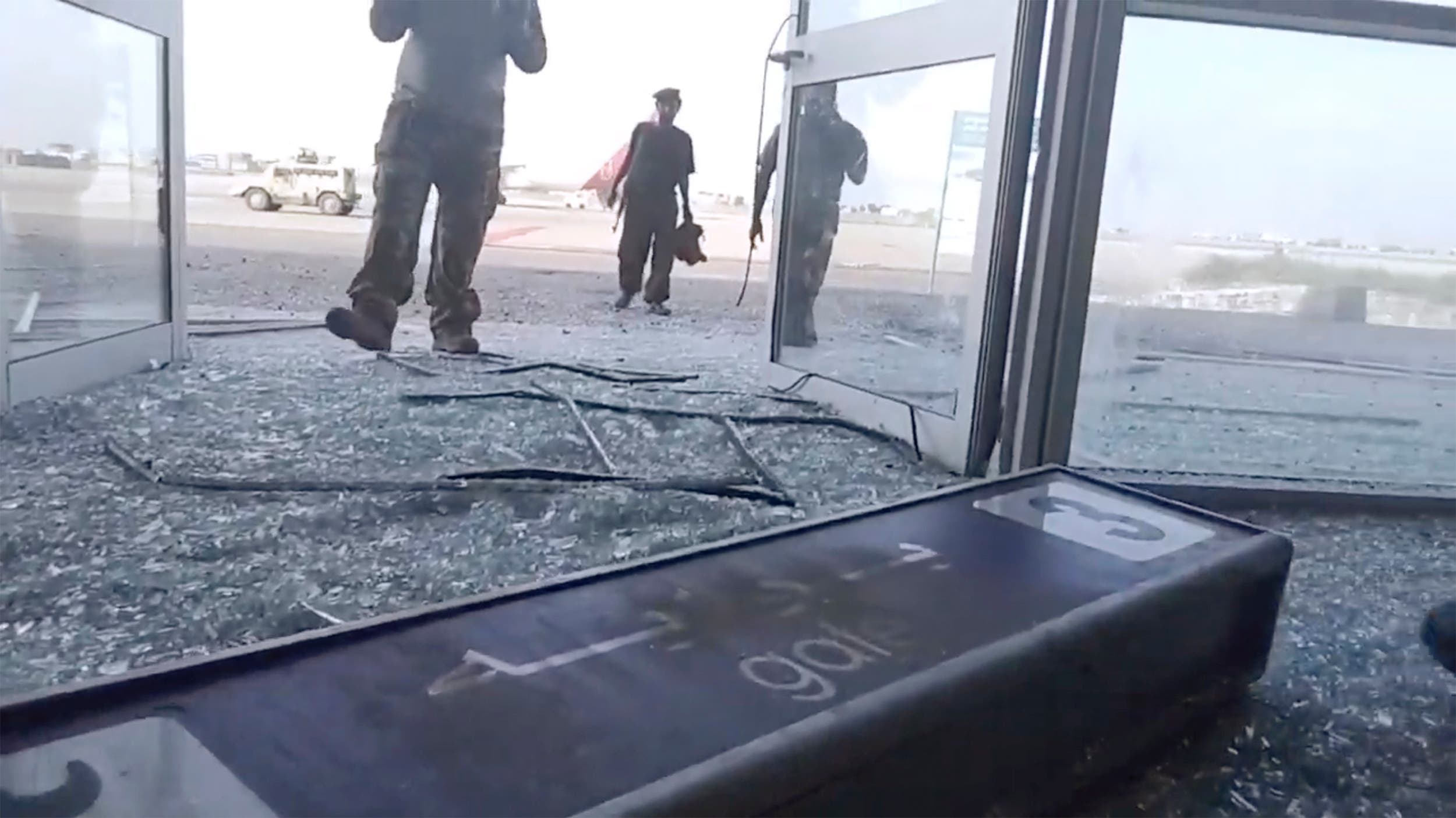 Glass and debris covers the damaged portion of the airport in Yemen's southern city of Aden after an explosion. (File photo: AP)