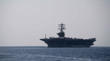 In this image released by the US Navy, the aircraft carrier USS Nimitz transits the Strait of Hormuz on September 18, 2020. (AFP)