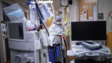 A member of the dialysis prepares to treat a patient with coronavirus in the intensive care unit at a hospital on May 1, 2020 in Leonardtown, Maryland. (AFP)