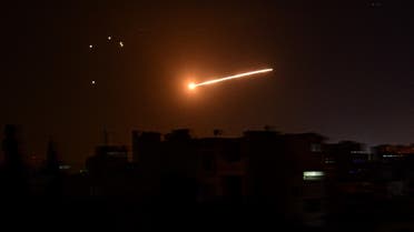 A handout picture released by the official Syrian Arab News Agency (SANA) on February 24, 2020, reportedly shows Syrian air defence intercepting an Israeli missile in the sky over the Syrian capital Damascus. (AFP)