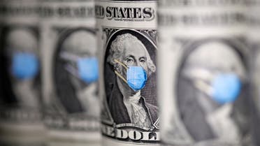 George Washington is seen with printed medical mask on the one Dollar banknotes in this illustration taken, March 31, 2020.  (Reuters)