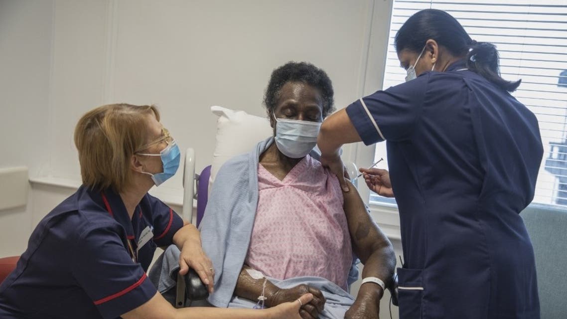 Nurse administers the Pfizer-BioNTech Covid-19 vaccine at the Royal Free hospital in London on December 8, 2020. (AFP)
