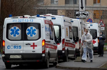 Ambulances queue outside Saint Petersburg's Pokrovskaya hospital, where patients suffering from the coronavirus disease are treated, on December 21, 2020. (AFP)